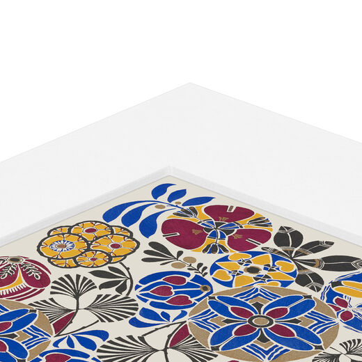 A close up of a corner of the print and its mount.